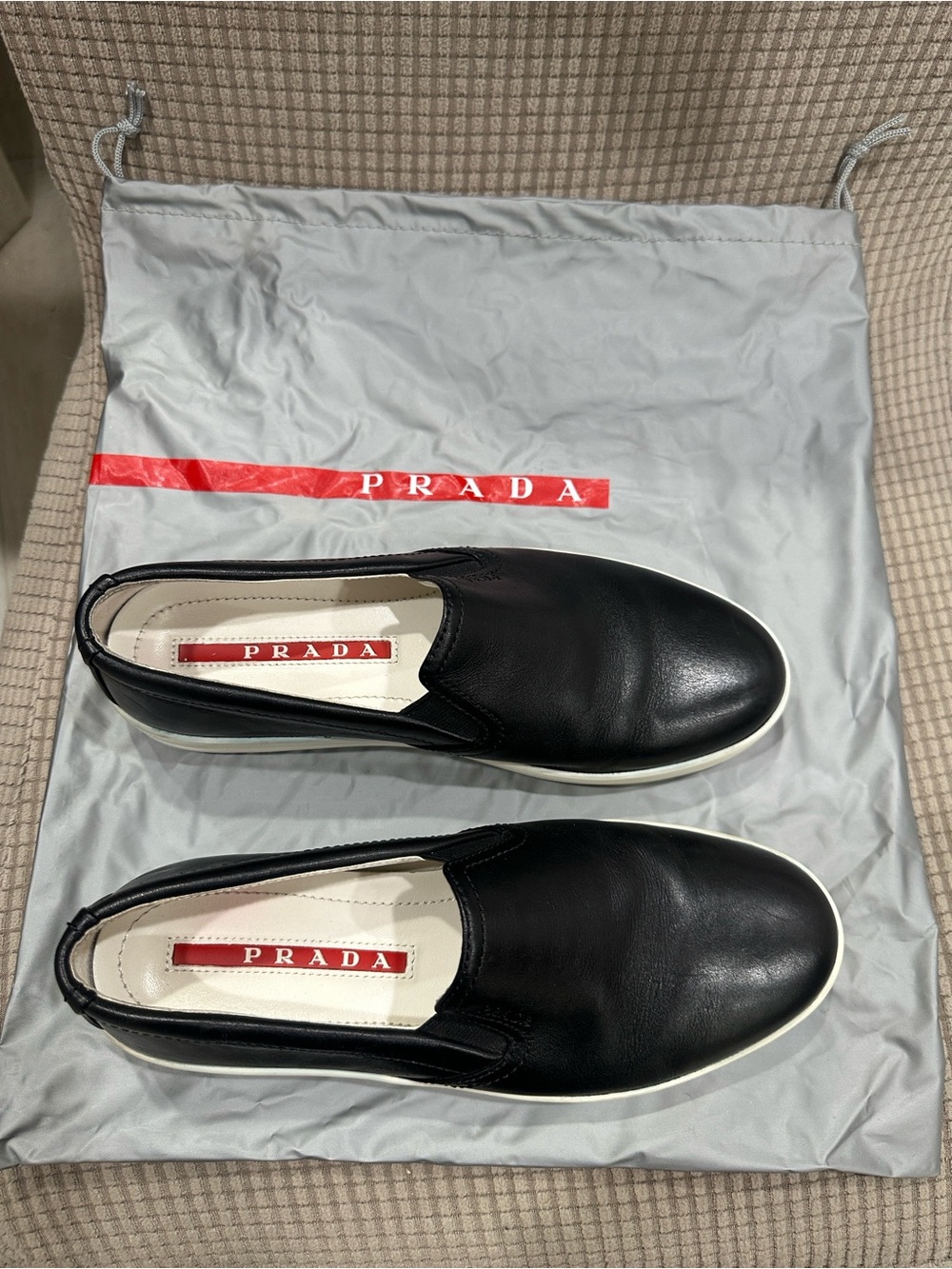 Women’s Prada Black Leather Slip-On Loafers with White Sole sport line